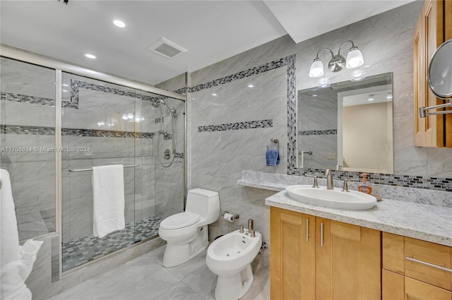 bathroom with a bidet, an enclosed shower, toilet, vanity, and tile walls