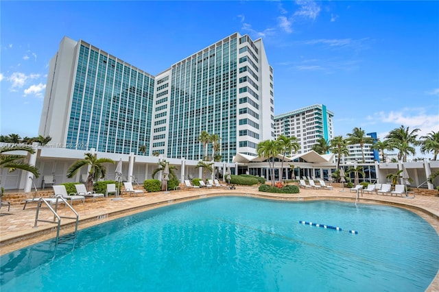 5055 Collins Ave Unit 14M, Miami Beach, FL 33140 - community pool with a patio area