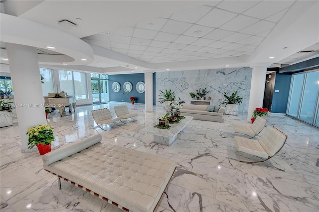 5055 Collins Ave Unit 14M, Miami Beach, FL 33140 - building lobby with a paneled ceiling and recessed lighting