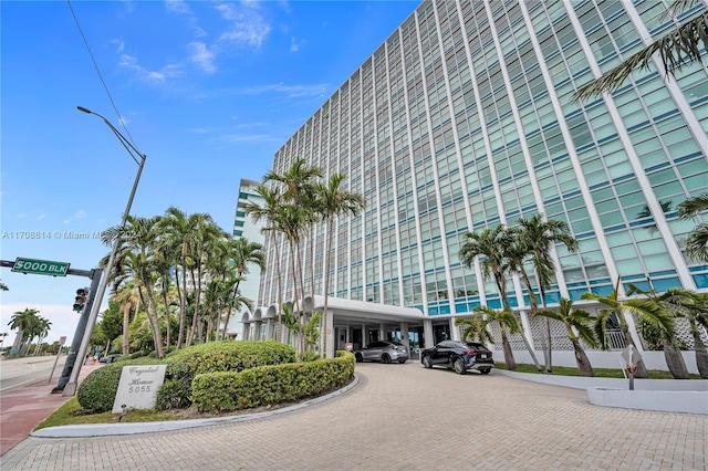 5055 Collins Ave Unit 14M, Miami Beach, FL 33140 - view of building exterior featuring decorative driveway