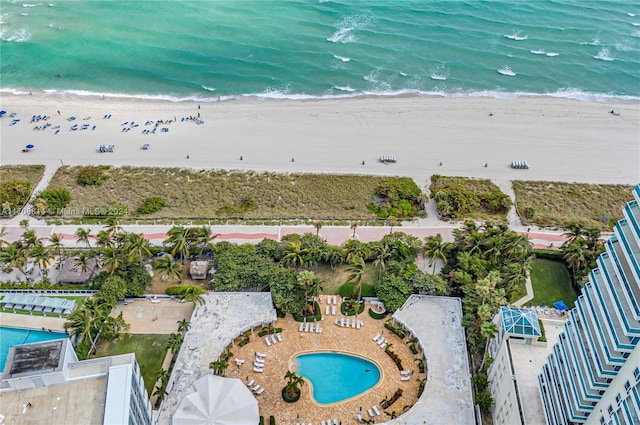 aerial view with a beach view and a water view