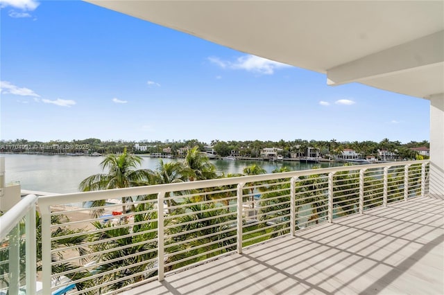 balcony featuring a water view