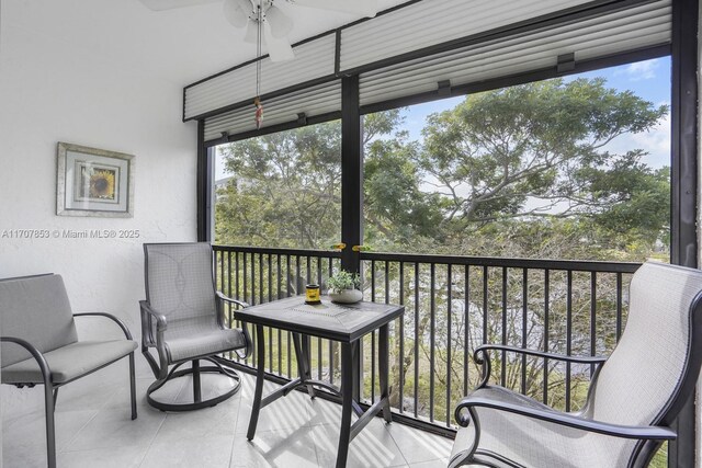 balcony featuring ceiling fan