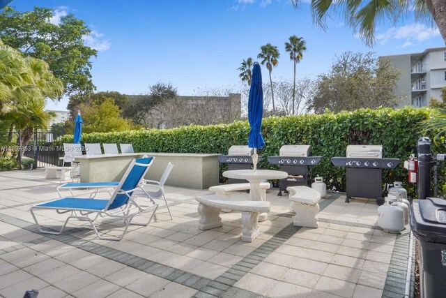 view of patio with a grill