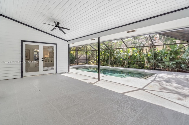 view of swimming pool with french doors, ceiling fan, and a patio area