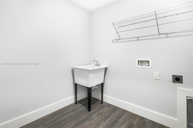 washroom with washer hookup, dark wood-type flooring, and electric dryer hookup