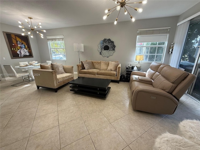 tiled living room featuring an inviting chandelier