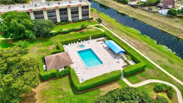 bird's eye view with a water view