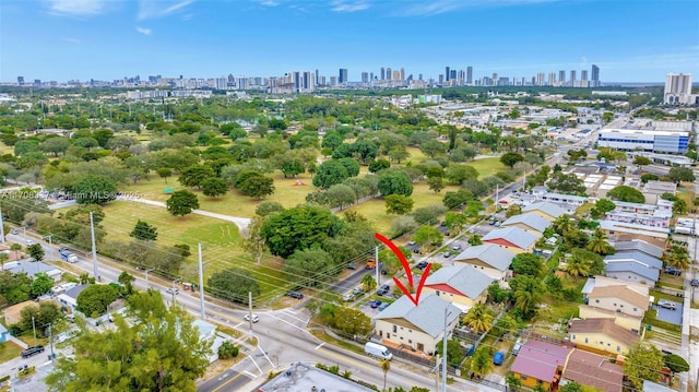 birds eye view of property featuring a view of city