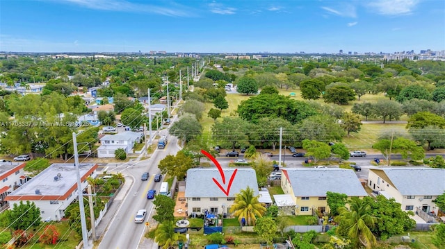 birds eye view of property with a residential view