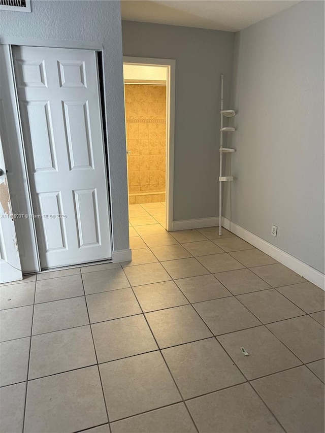 interior space with visible vents and baseboards