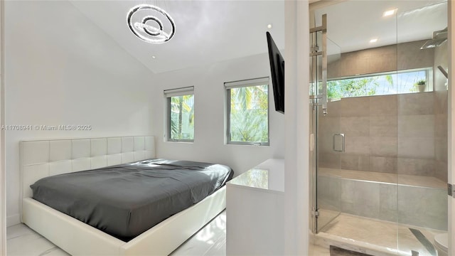 bedroom with multiple windows and vaulted ceiling