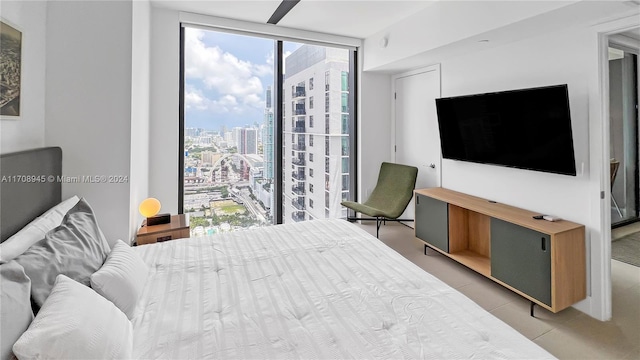 bedroom featuring floor to ceiling windows