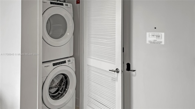 laundry room featuring stacked washing maching and dryer