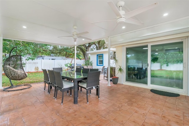 view of patio featuring ceiling fan