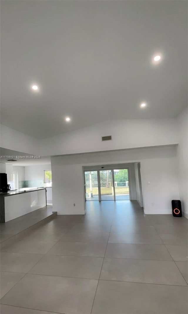 spare room featuring visible vents and recessed lighting