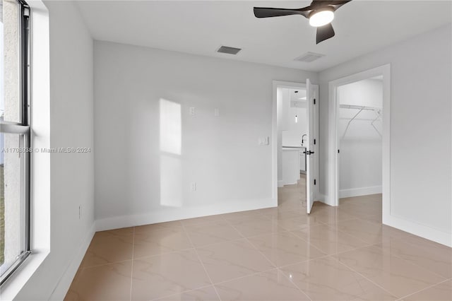 empty room with ceiling fan