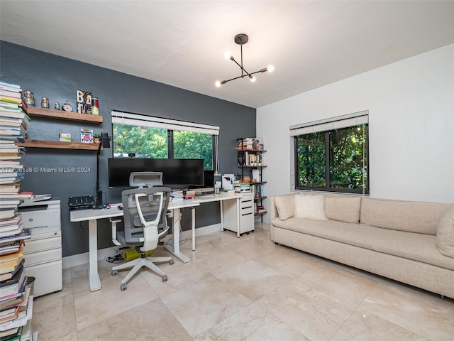 office featuring a chandelier