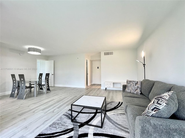 living room featuring light wood-type flooring