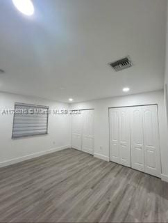 interior space with hardwood / wood-style floors