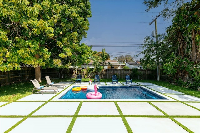 view of pool with a patio area