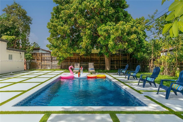 view of pool with a patio area