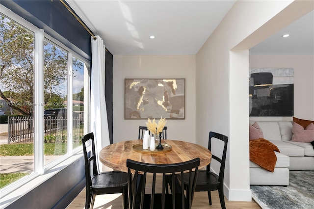 dining room with light wood-type flooring