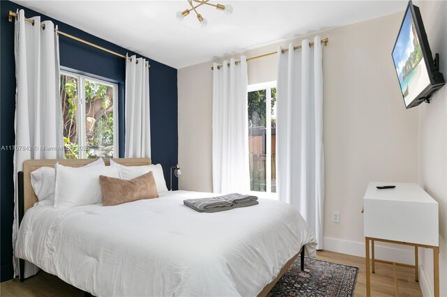 bedroom featuring hardwood / wood-style flooring