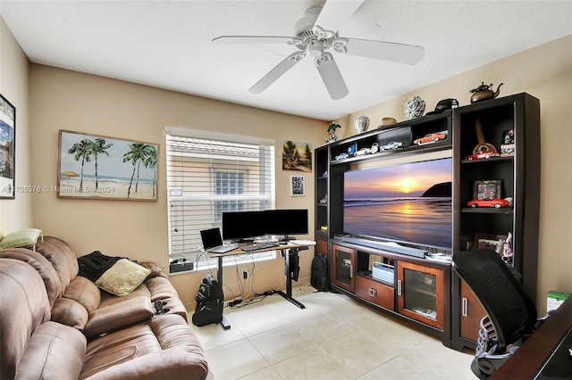 living room featuring ceiling fan and light tile patterned floors