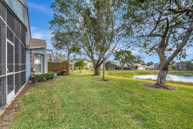 view of yard with a water view