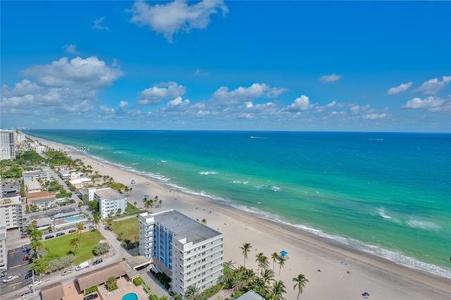 bird's eye view featuring a view of the beach and a water view