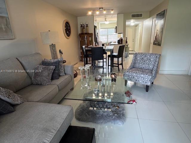 living room featuring tile patterned floors