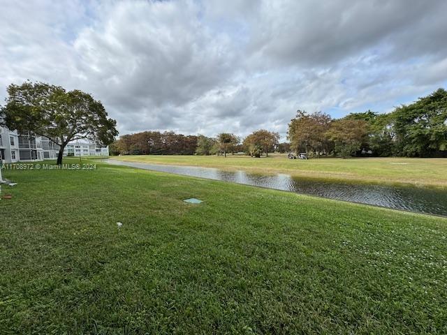 view of yard featuring a water view