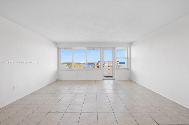 view of tiled spare room