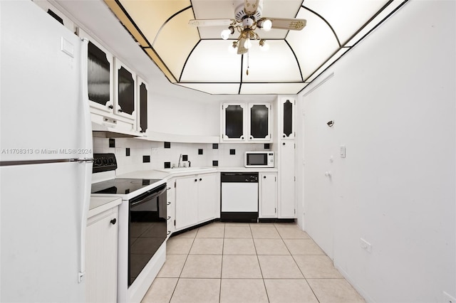 kitchen featuring white cabinetry, ceiling fan, tasteful backsplash, white appliances, and light tile patterned floors