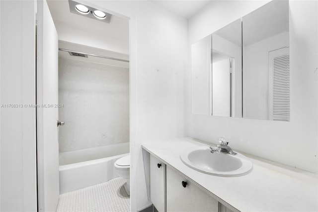 full bathroom featuring tile patterned floors, vanity, toilet, and tub / shower combination