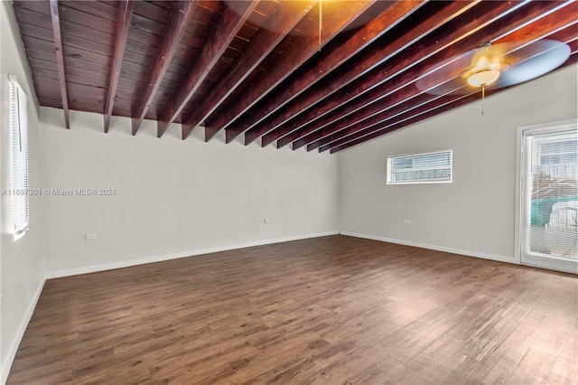 basement with dark hardwood / wood-style flooring