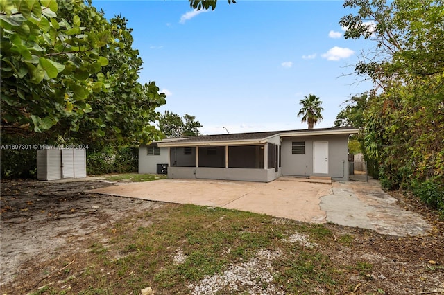 back of house featuring a patio