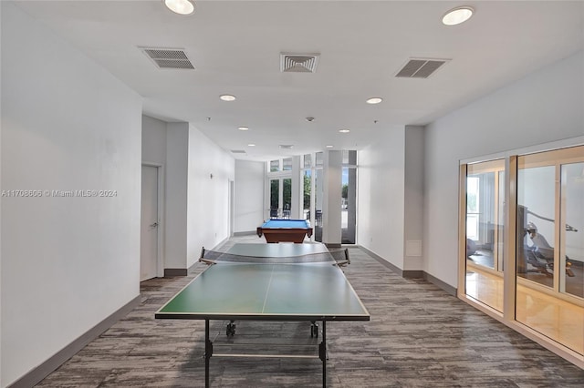 rec room featuring french doors, dark hardwood / wood-style flooring, a wealth of natural light, and billiards