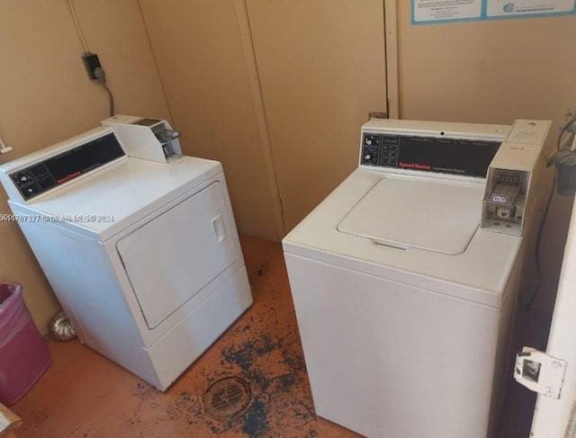 laundry room featuring washing machine and dryer