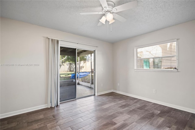 spare room featuring ceiling fan, a textured ceiling, and hardwood / wood-style flooring