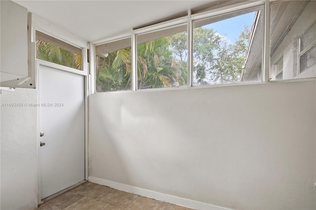 interior space with light tile patterned floors