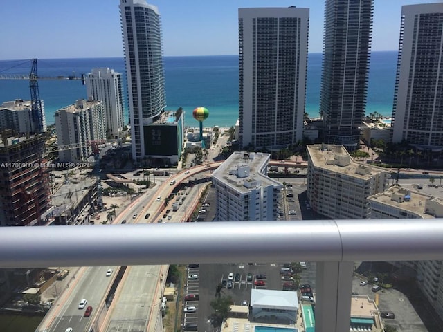 property's view of city featuring a water view