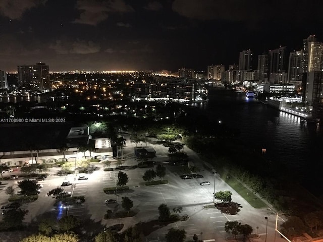 property's view of city with a water view