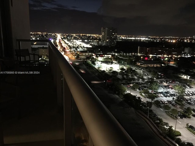 view of balcony at twilight