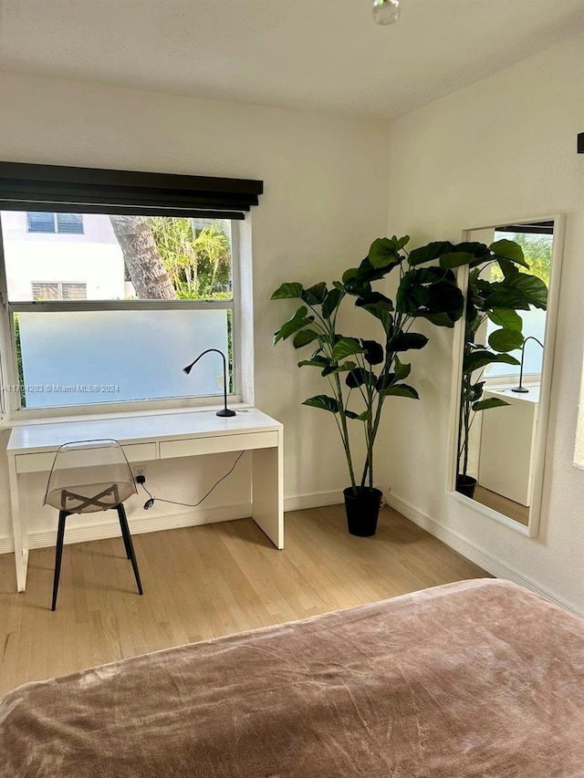 miscellaneous room featuring hardwood / wood-style floors