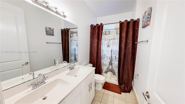 bathroom featuring tile patterned floors, vanity, a shower with shower curtain, and toilet