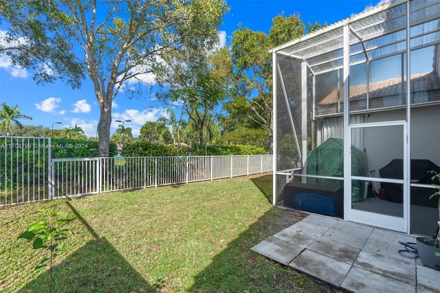 view of yard featuring a lanai