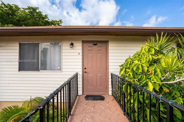 doorway to property with a balcony