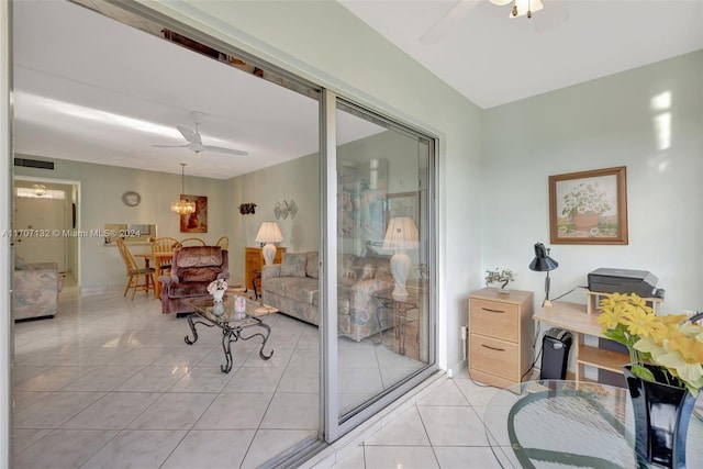 interior space featuring ceiling fan